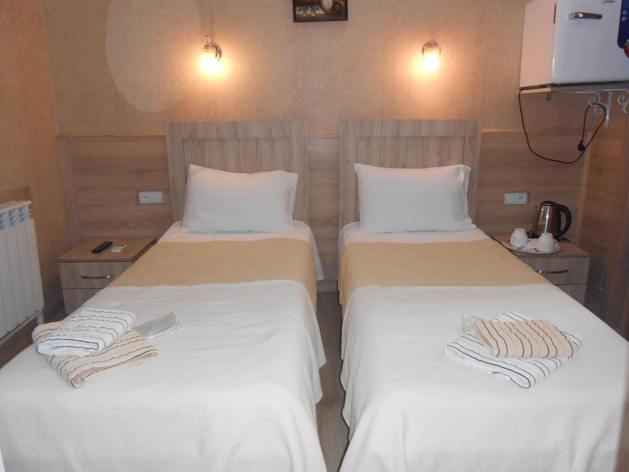 Anseza Hotell Kutaisi Rum bild
